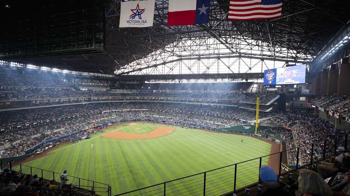 Fans find their seats at Globe Life Park before the MLB All-Star baseball game, Tuesday, July 16, 2024, in Arlington, Texas.