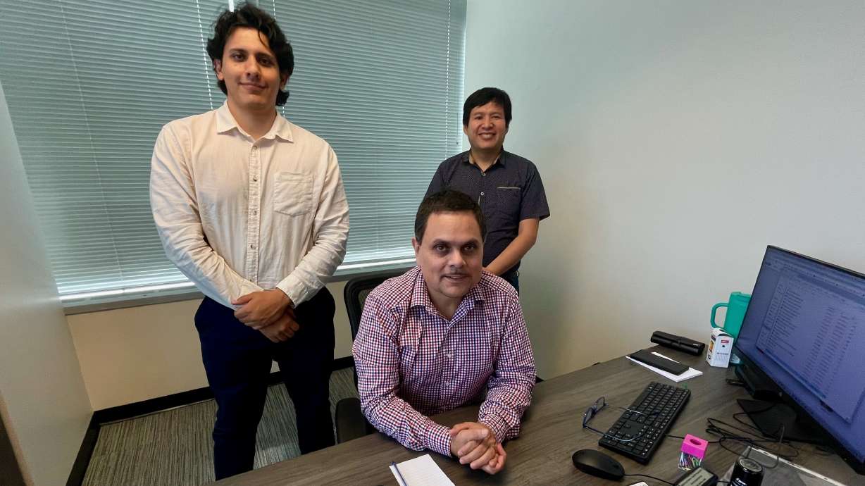 Czibor Chicata-Sutmöller, seated, the head of the new Peruvian Consulate in Utah, at the consular offices in Salt Lake City on Monday. He's flanked by his assistants, Antonio Ruelas, right, and Rodrigo Andia.