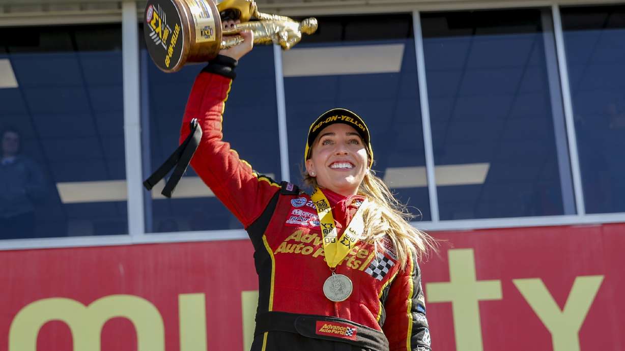 FILE - In this photo provided by the NHRA, Brittany Force celebrates her win in the Top Fuel final in the Mopar Express Lane NHRA SpringNationals in Baytown, Texas, Sunday, April 14, 2019. Brittany Force will return to her Top Fuel dragster this week in Seattle, her first time competing since her father John's horrific accident in Virginia last month.