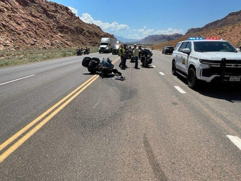 A motorcyclist was injured Wednesday afternoon when he crashed into a truck while pulling out of Arches National Park.