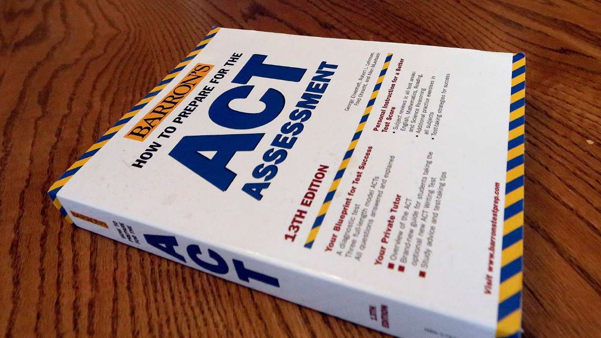 An ACT Assessment preparation book is seen, April 1, 2014, in Springfield, Ill. On July 15, Janet Godwin, CEO of the ACT test, announced that a pair of “fundamental” changes would be coming to the test starting in 2025.