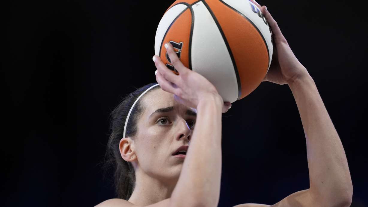Indiana Fever's Caitlin Clark shoots free throws in the first half of a WNBA basketball game against the Dallas Wings, Wednesday, July 17, 2024, in Arlington, Texas.