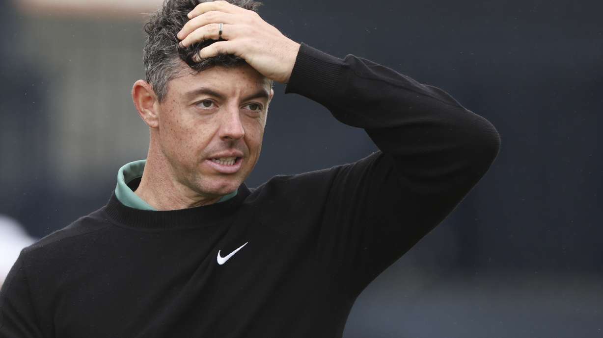 Rory McIlroy of Northern Ireland reacts as he walks from the 18th green following his opening round of the British Open Golf Championships at Royal Troon golf club in Troon, Scotland, Thursday, July 18, 2024.