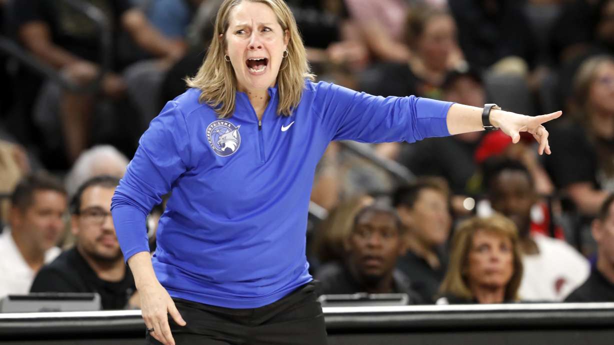 Minnesota Lynx head coach Cheryl Reeve calls out to players during the first half of an WNBA basketball game against the Las Vegas Aces Tuesday, June 11, 2024, in Las Vegas. In her dual role as coach and president of basketball operations, Reeve has been trying to bring the four-time WNBA champion club back to title contention after some recent rough seasons.