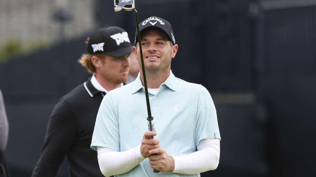 Sam Hutsby of England reacts after missing a putt on the 18th green during his opening round of the British Open Golf Championships at Royal Troon golf club in Troon, Scotland, Thursday, July 18, 2024.