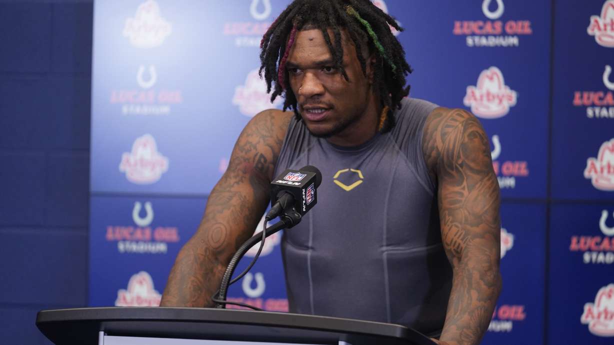 FILE - Indianapolis Colts quarterback Anthony Richardson speaks after an NFL football game against the Los Angeles Rams, Oct. 1, 2023, in Indianapolis. Richardson learned one lesson about concussions the hard way last season when he sat out six quarters after taking an unnecessary shot at Houston. Now he wants to help a local high school football program do a better job avoiding head injuries. On Thursday, July 18, 2024, Richardson surprised the Speedway Sparkplugs by partnering with VICIS and Certor Sports to donate dozens of helmets to the school's football program.