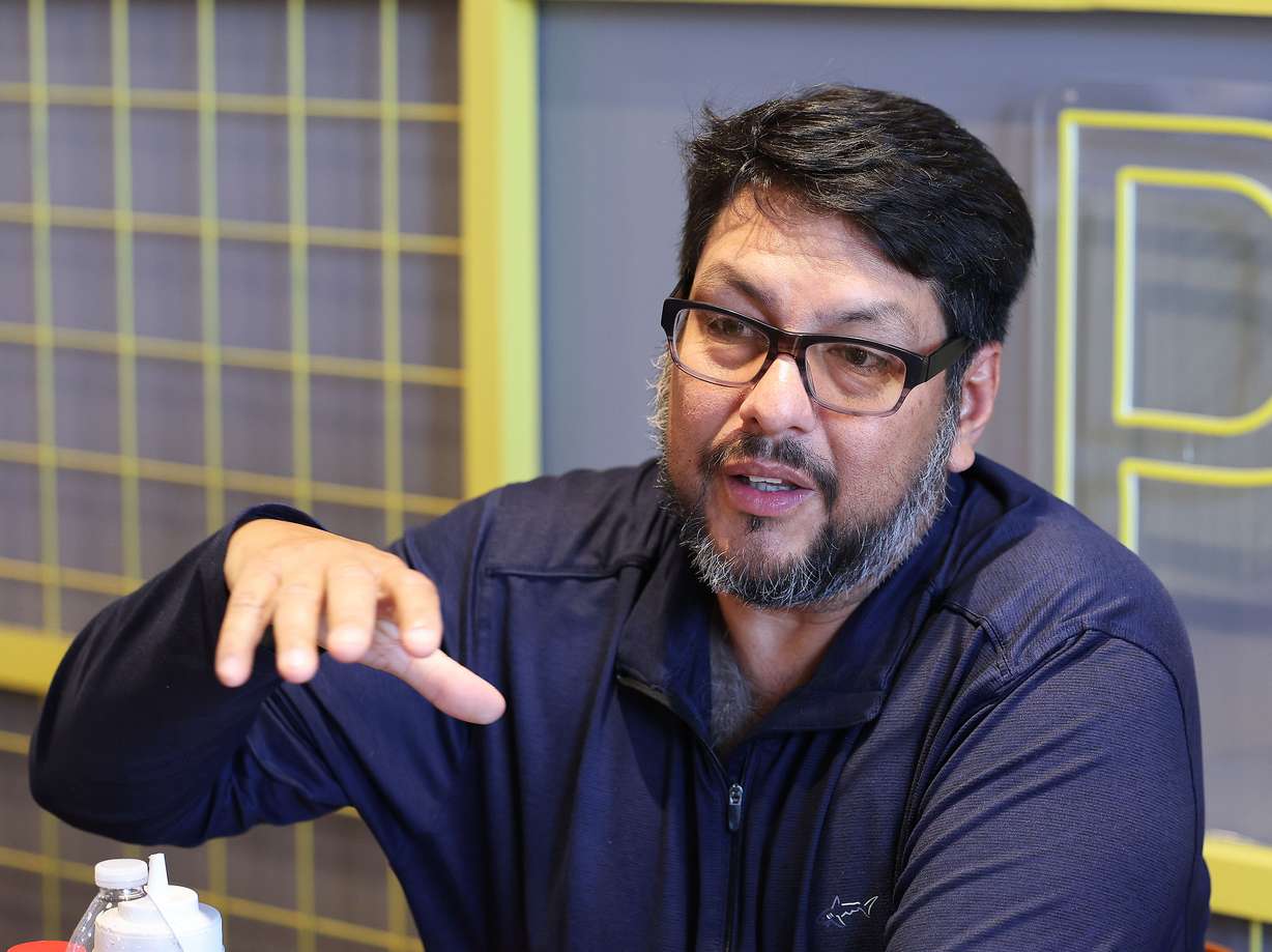 Jose Morales talks about the Venezuelan presidential elections in Draper on Wednesday. The Venezuelan community in Utah is paying close attention as July 28 presidential elections loom in Venezuela.