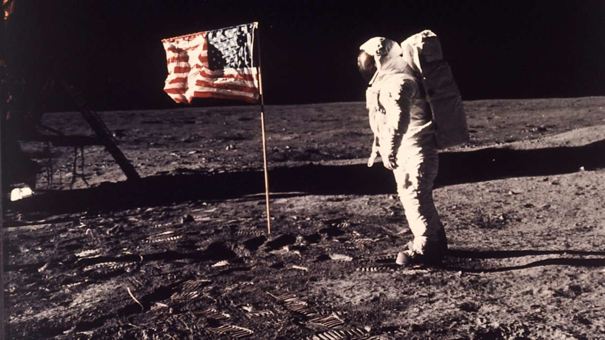 Astronaut Edwin "Buzz" Aldrin poses for a photograph beside the U.S. flag deployed on the moon during the Apollo 11 mission on July 20, 1969.