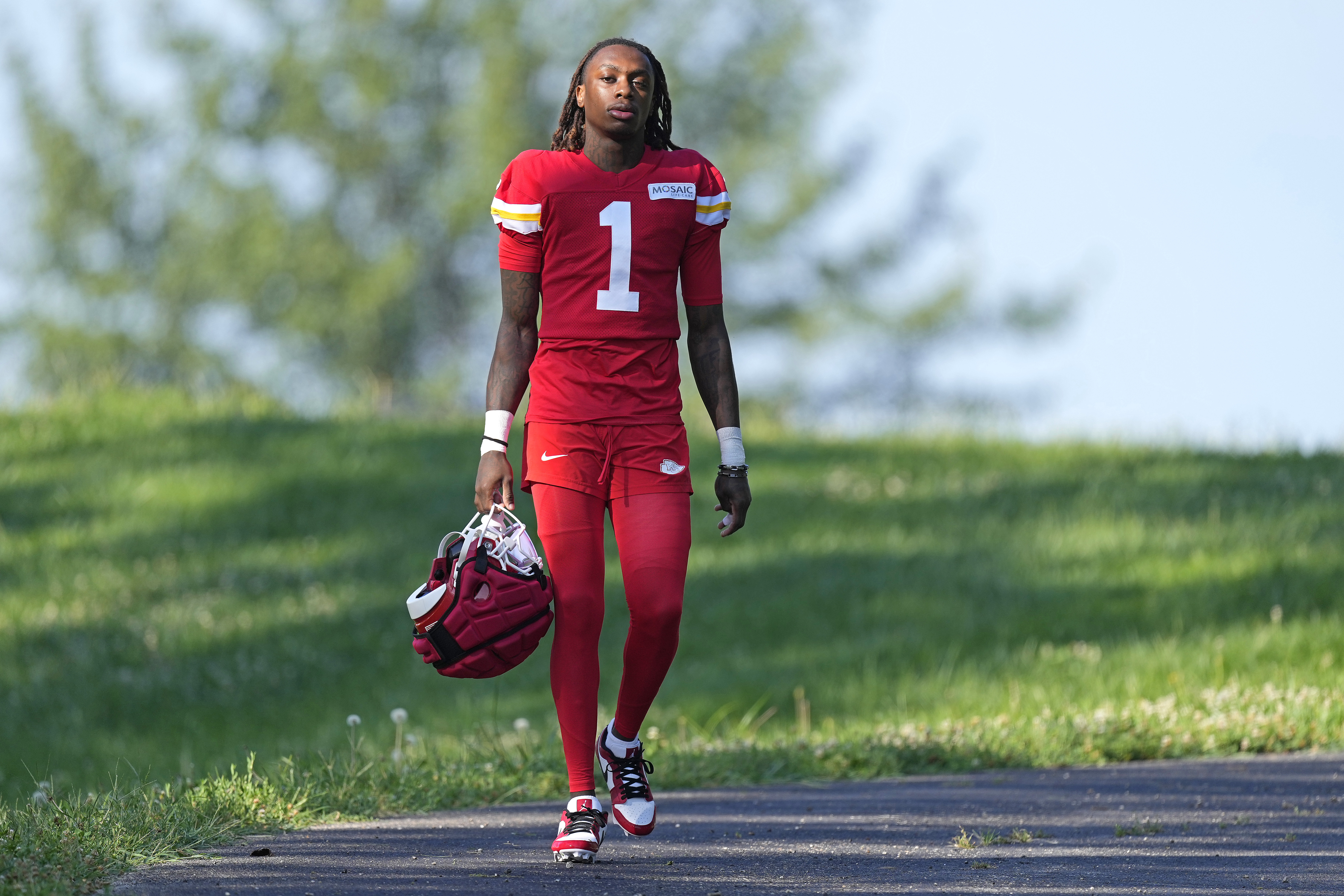 Kansas City Chiefs wide receiver Xavier Worthy walks to practice during NFL football training camp Thursday, July 18, 2024, in St. Joseph, Mo. 