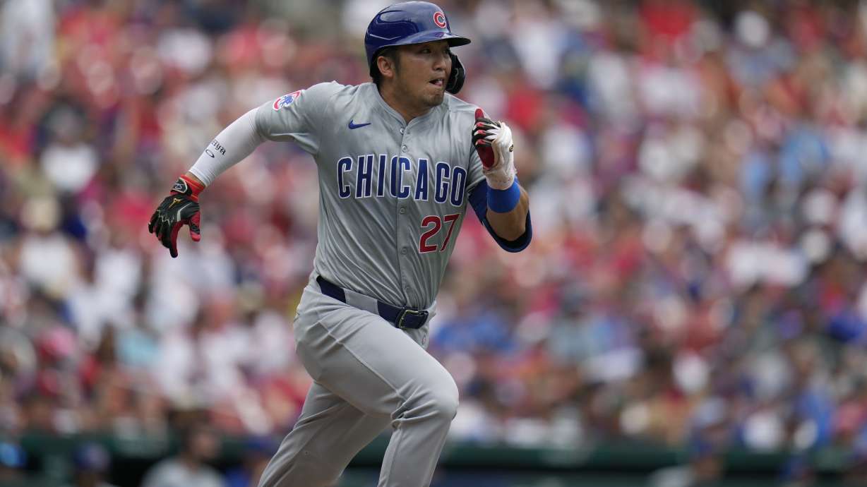 Chicago Cubs' Seiya Suzuki heads to first on an RBI single during the third inning of a baseball game against the St. Louis Cardinals Sunday, July 14, 2024, in St. Louis.