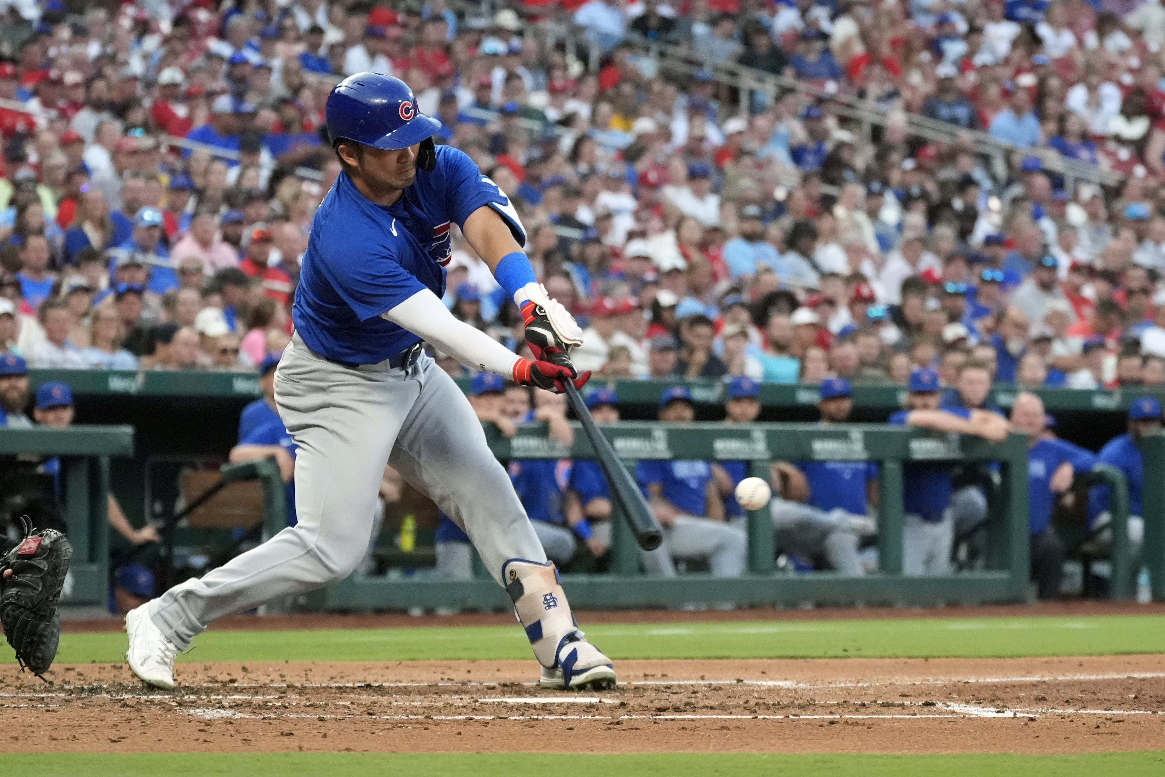 Chicago Cubs' Seiya Suzuki hits an RBI single during the second inning in the second baseball game of a doubleheader against the St. Louis Cardinals Saturday, July 13, 2024, in St. Louis. 