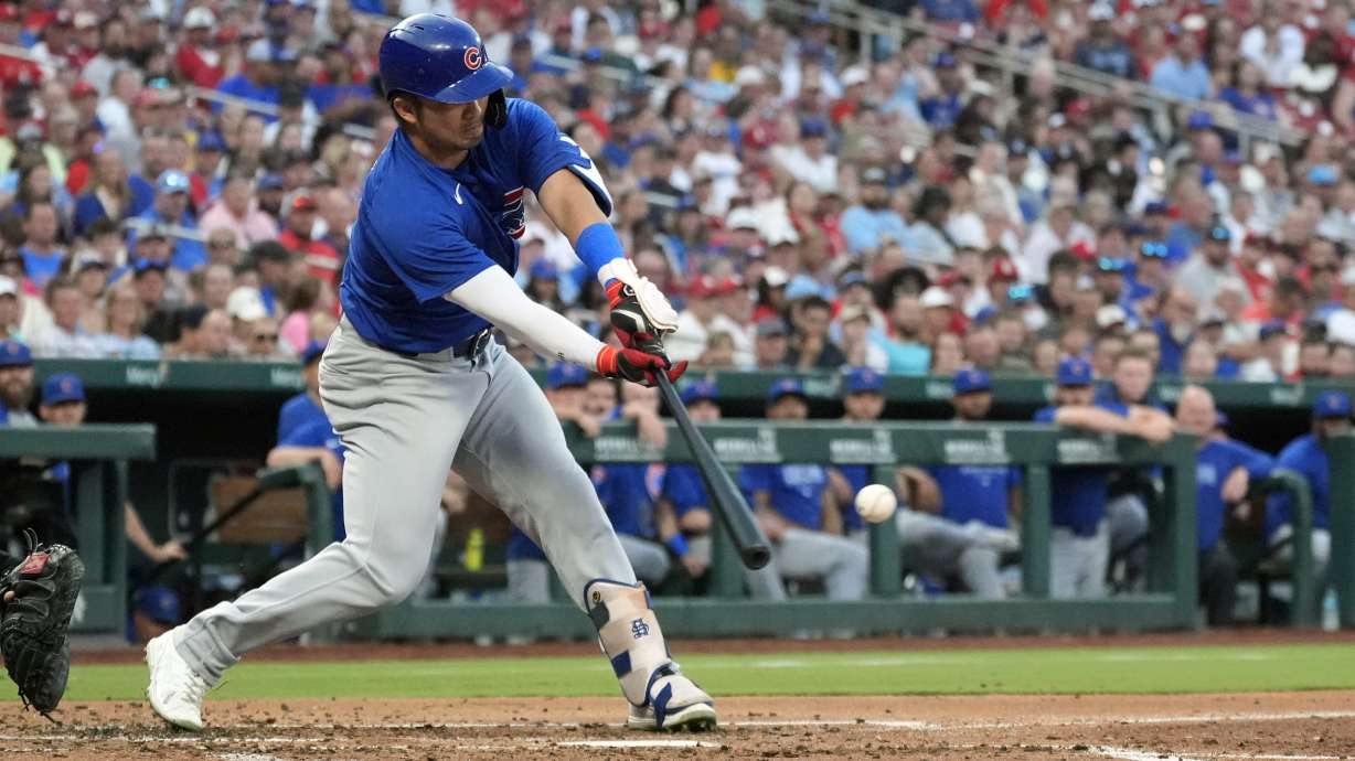 Chicago Cubs' Seiya Suzuki hits an RBI single during the second inning in the second baseball game of a doubleheader against the St. Louis Cardinals Saturday, July 13, 2024, in St. Louis.