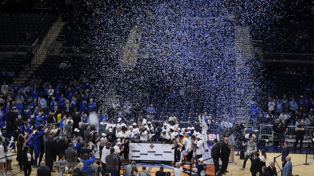 FILE- Seton Hall players celebrate after defeating Indiana State in an NCAA college basketball game for the championship of the NIT, Thursday, April 4, 2024, in Indianapolis. The NIT will hold the semifinals and championship of its postseason tournament next spring in Butler's Hinkle Fieldhouse for the second straight year.