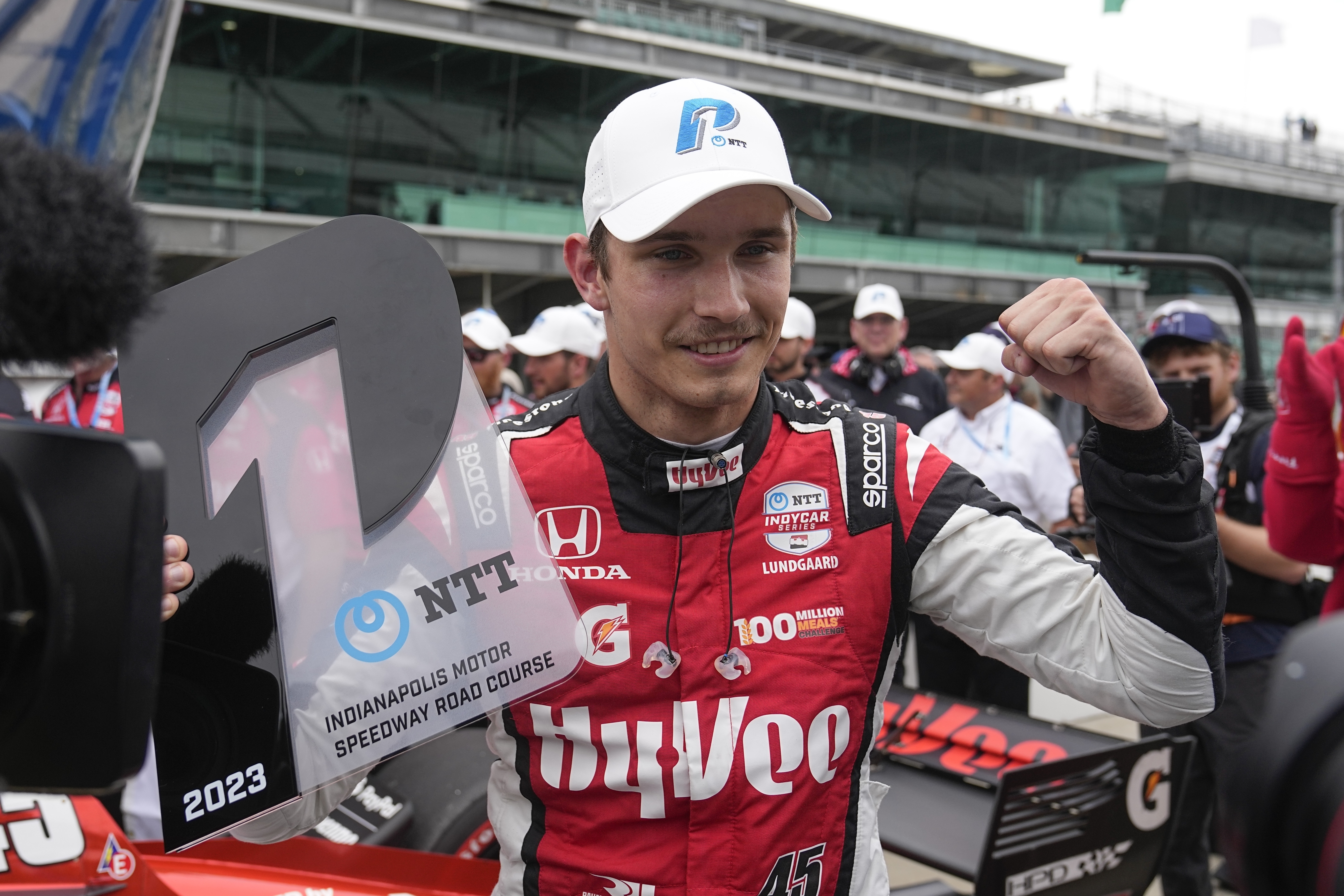 FILE - Christian Lundgaard, of Denmark, celebrates after winning the pole for the IndyCar Grand Prix auto race at Indianapolis Motor Speedway, Friday, May 12, 2023, in Indianapolis. Arrow McLaren Racing is making yet another change to its IndyCar lineup and will replace Alexander Rossi with Christian Lundgaard. Rossi spent last season and this with McLaren, while Lundgaard, of Denmark, has been with Rahal Letterman Lanigan. 