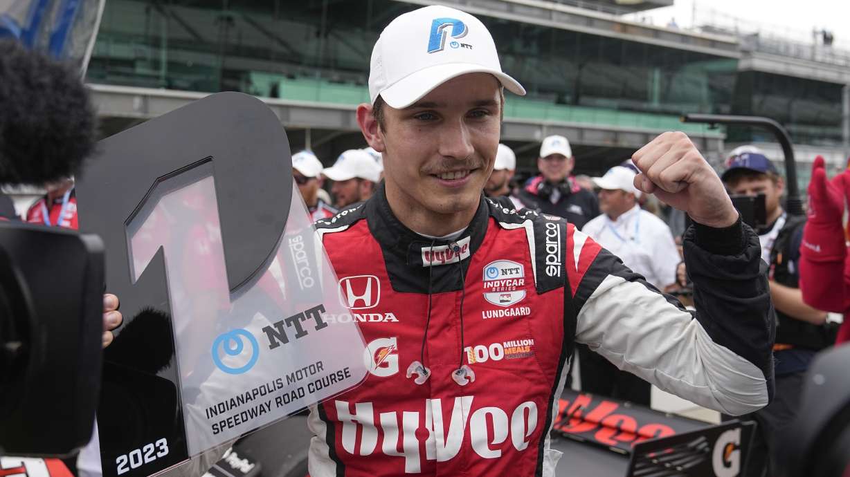 FILE - Christian Lundgaard, of Denmark, celebrates after winning the pole for the IndyCar Grand Prix auto race at Indianapolis Motor Speedway, Friday, May 12, 2023, in Indianapolis. Arrow McLaren Racing is making yet another change to its IndyCar lineup and will replace Alexander Rossi with Christian Lundgaard. Rossi spent last season and this with McLaren, while Lundgaard, of Denmark, has been with Rahal Letterman Lanigan.