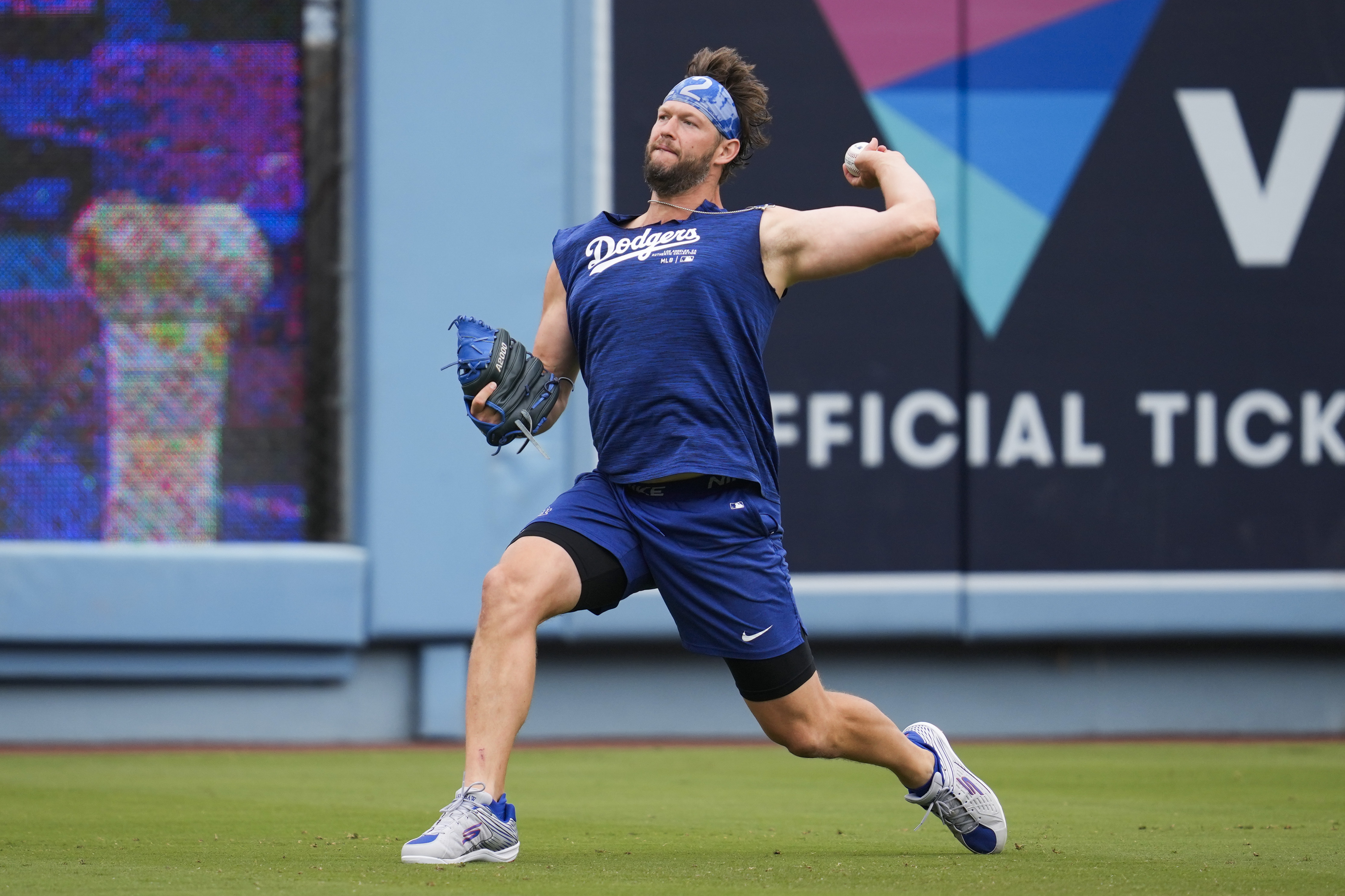 FILE - Los Angeles Dodgers' Clayton Kershaw works out before a baseball game against the Colorado Rockies in Los Angeles, Sunday, June 2, 2024. Los Angeles Dodgers left-hander Kershaw made a second rehab start in his bid to return from offseason left shoulder surgery, pitching four innings for Triple-A Oklahoma City against Round Rock.