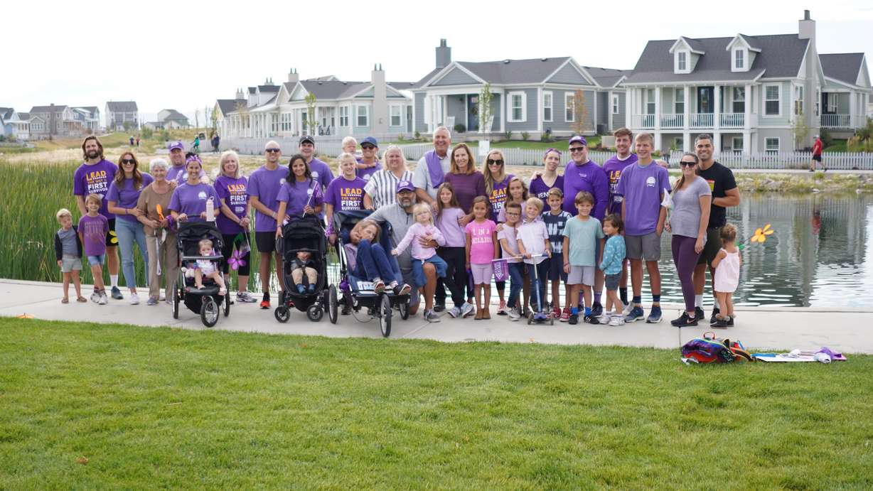 Family members participate in the Walk to End Alzheimer's event in honor of Laneeda Lucero who was battling early-onset Alzheimer's at the time.