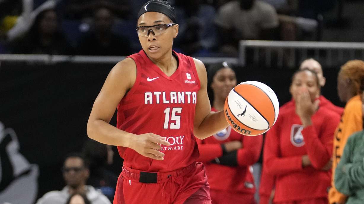 FILE - Atlanta Dream's Allisha Gray advances the ball during a WNBA basketball game against the Chicago Sky on Wednesday, July 10, 2024, in Chicago. Gray became the first player in WNBA history to win both the 3-point and skills competition in the same year, capturing both titles Friday, July 19.