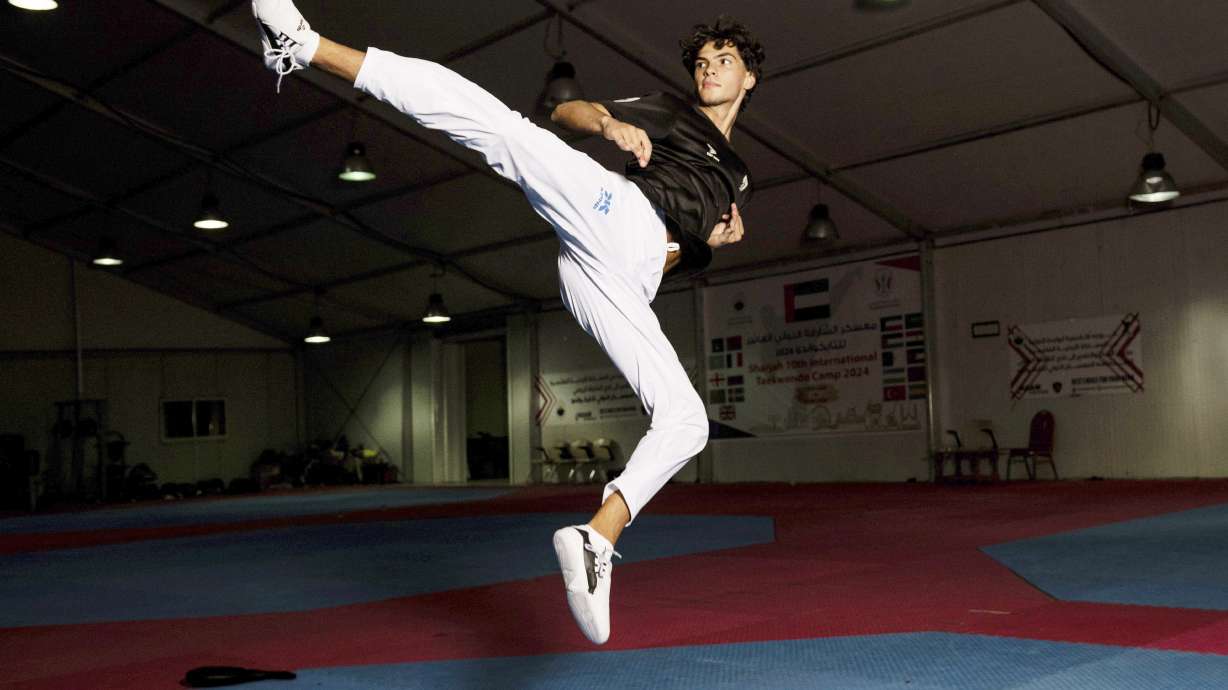 Omar Ismail, who was born in Dubai and will be competing for the Palestinian territories at the Paris Olympics, practices taekwondo in Sharjah, United Arab Emirates, on Thursday, June 20, 2024.