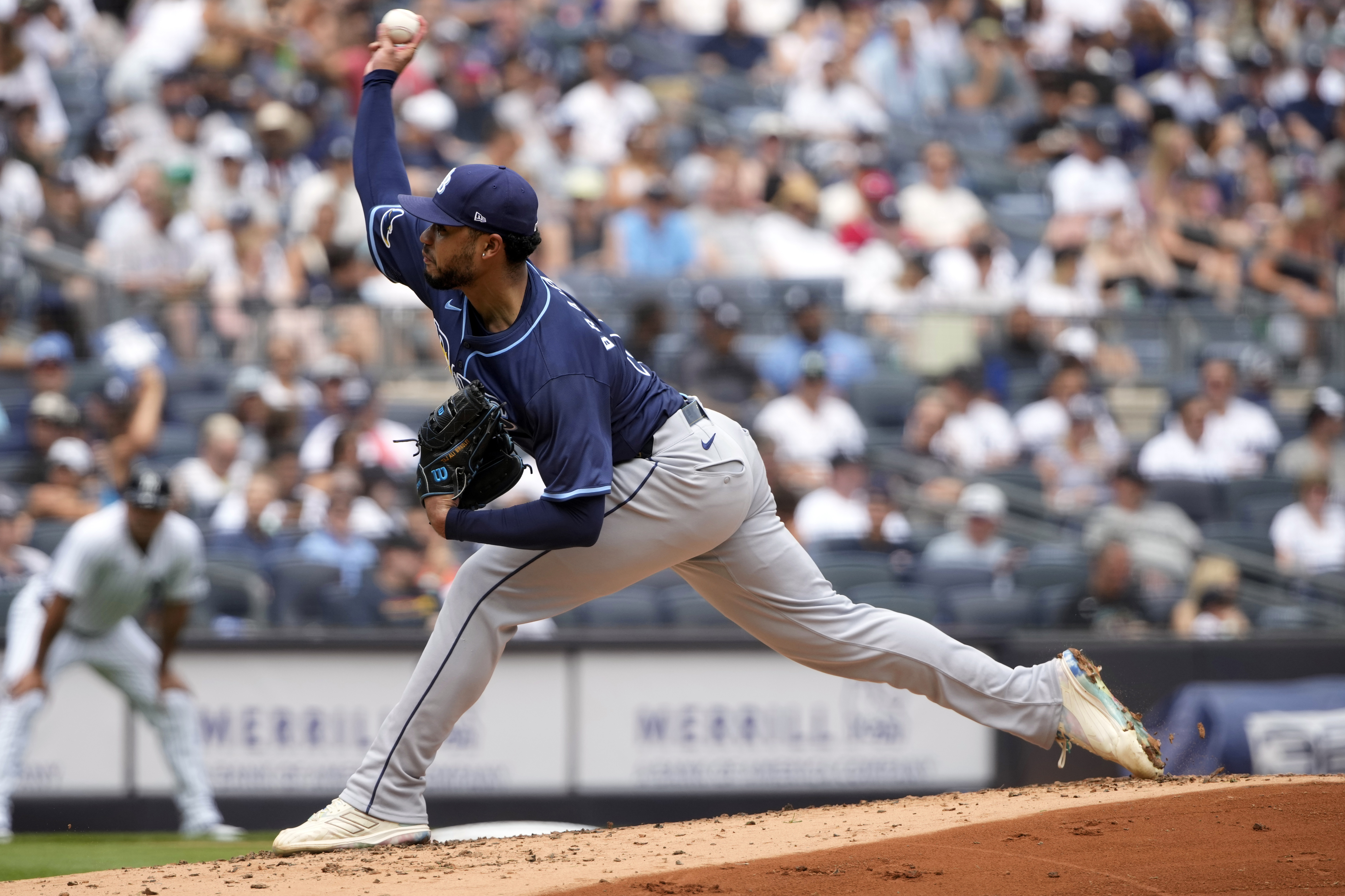 Tampa Bay Rays pitcher Taj Bradley throws during the second inning of a baseball game against the New York Yankees, Saturday, July 20, 2024, in New York. 