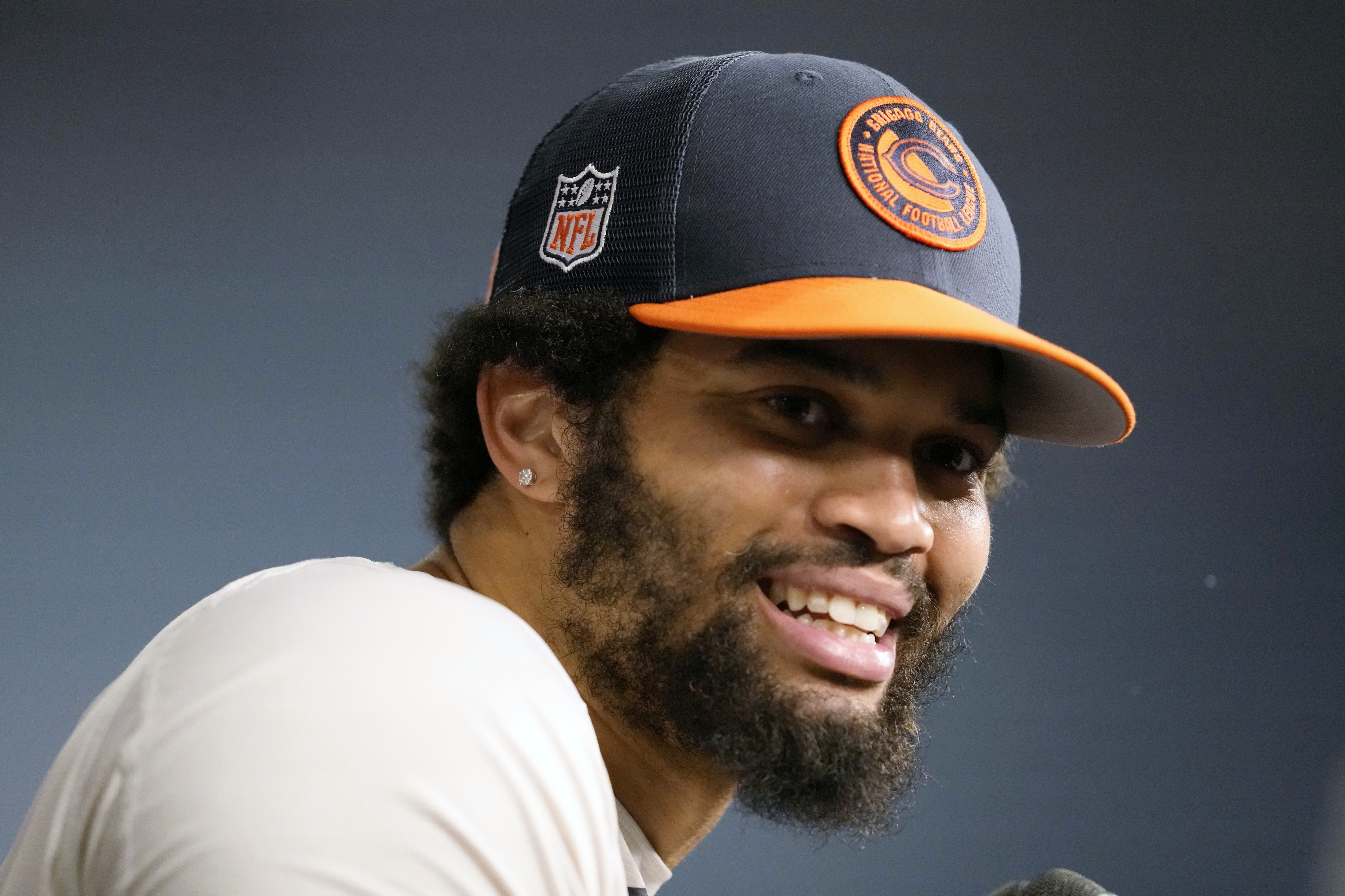 FILE - Chicago Bears quarterback Caleb Williams speaks during a news conference after practice at the NFL football team's mandatory minicamp in Lake Forest, Ill., Thursday, June 6, 2024. The Chicago Bears have locked in their top two rookies, agreeing to four-year contracts with No. 1 overall draft pick Caleb Williams and No. 9 selection Rome Odunze and avoiding any training camp drama with their prized quarterback and receiver.