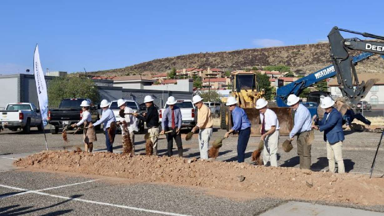 Speakers from the St. George Musical Theater groundbreaking ceremony turn over dirt to celebrate the building of a brand new performing arts venue, St. George, Thursday.