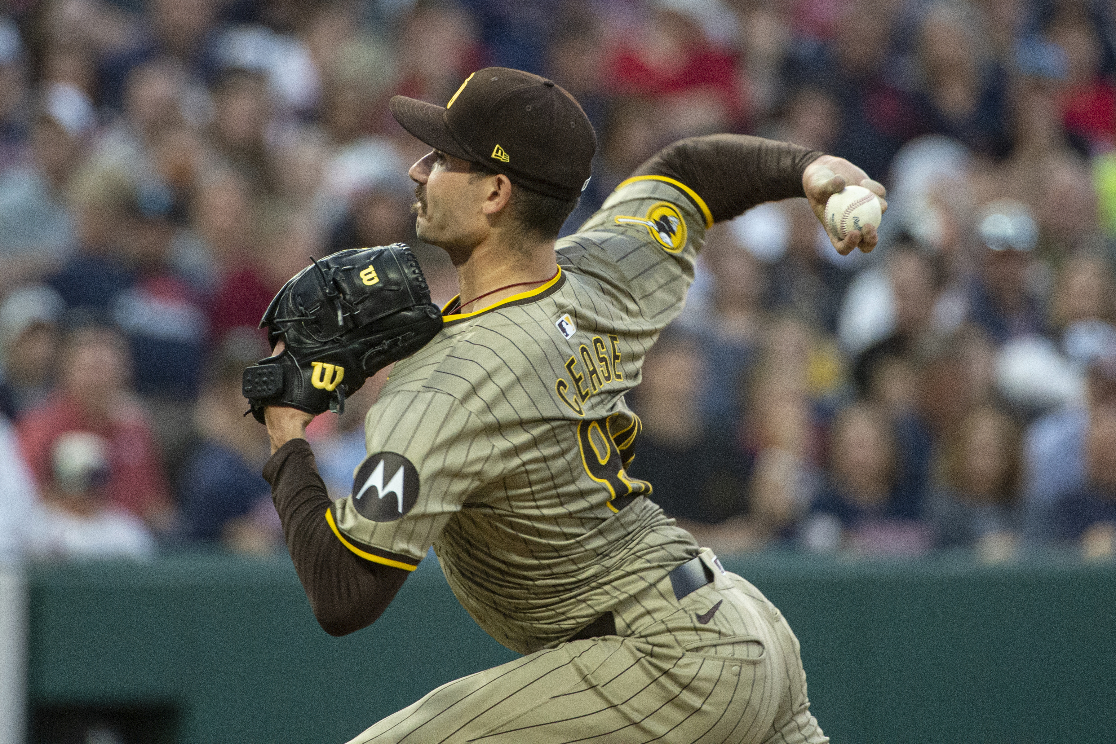 San Diego Padres starting pitcher Dylan Cease delivers against the Cleveland Guardians during the fifth inning of a baseball game in Cleveland, Saturday, July 20, 2024. 