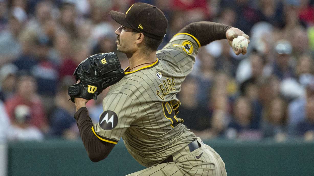 San Diego Padres starting pitcher Dylan Cease delivers against the Cleveland Guardians during the fifth inning of a baseball game in Cleveland, Saturday, July 20, 2024.