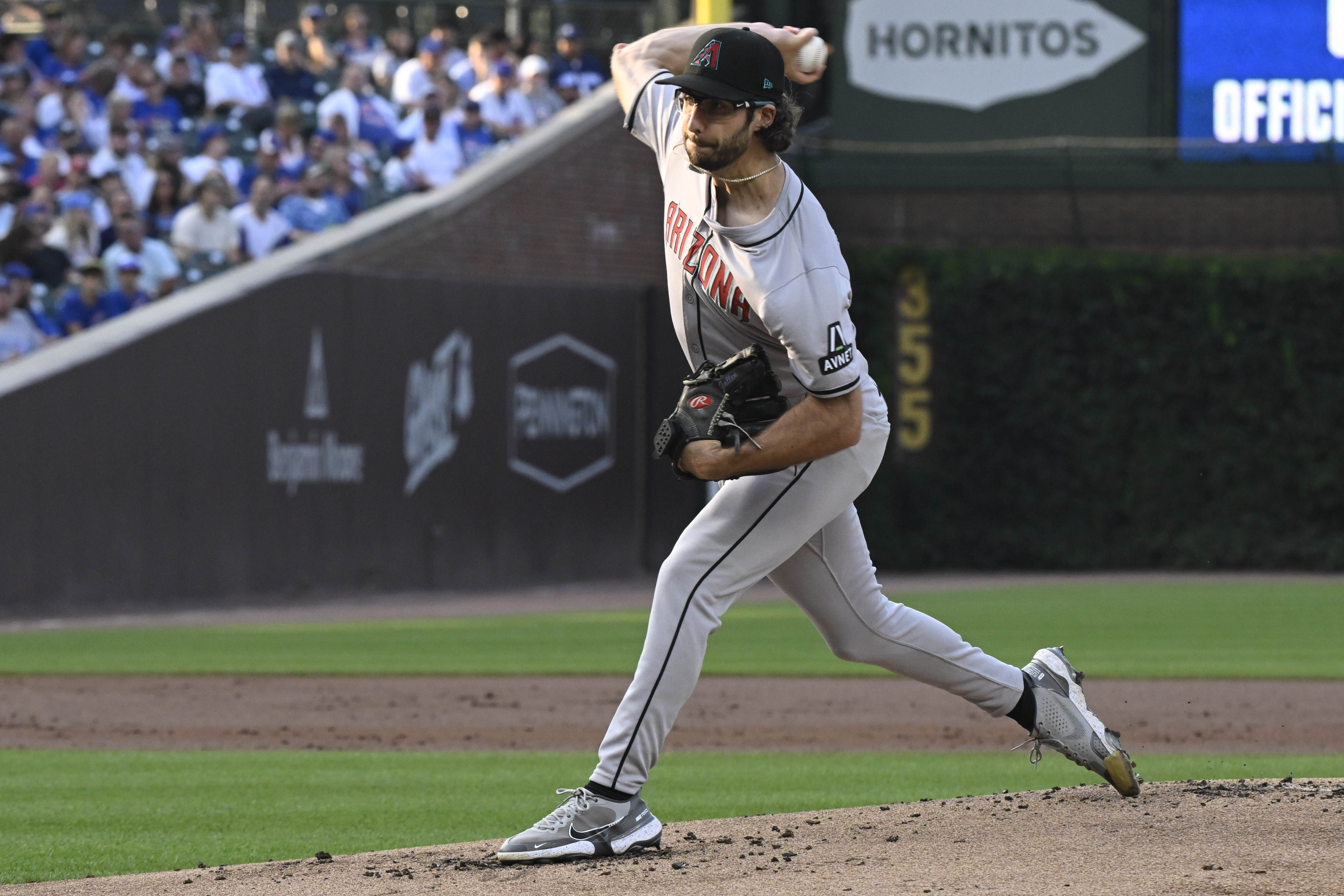 Arizona Diamondbacks pitcher Zac Gallen delivers during the first inning of a baseball game against the Chicago Cubs, Saturday, July 20, 2024, in Chicago. 