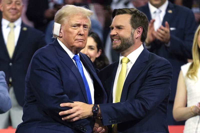 Republican presidential candidate former President Donald Trump, left, is introduced alongside Republican vice presidential candidate Sen. JD Vance, R-Ohio, during the Republican National Convention, Tuesday, in Milwaukee.