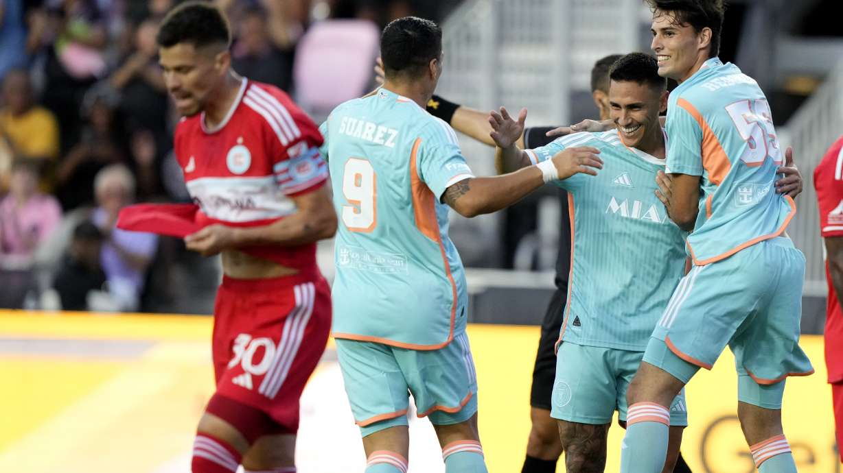 Inter Miami midfielder Matías Rojas, csecond from right, celebrates with forward Luis Suárez (9) and midfielder Federico Redondo (55) after scoring during the first half of an MLS soccer match against the Chicago Fire, Saturday, July 20, 2024, in Fort Lauderdale, Fla.