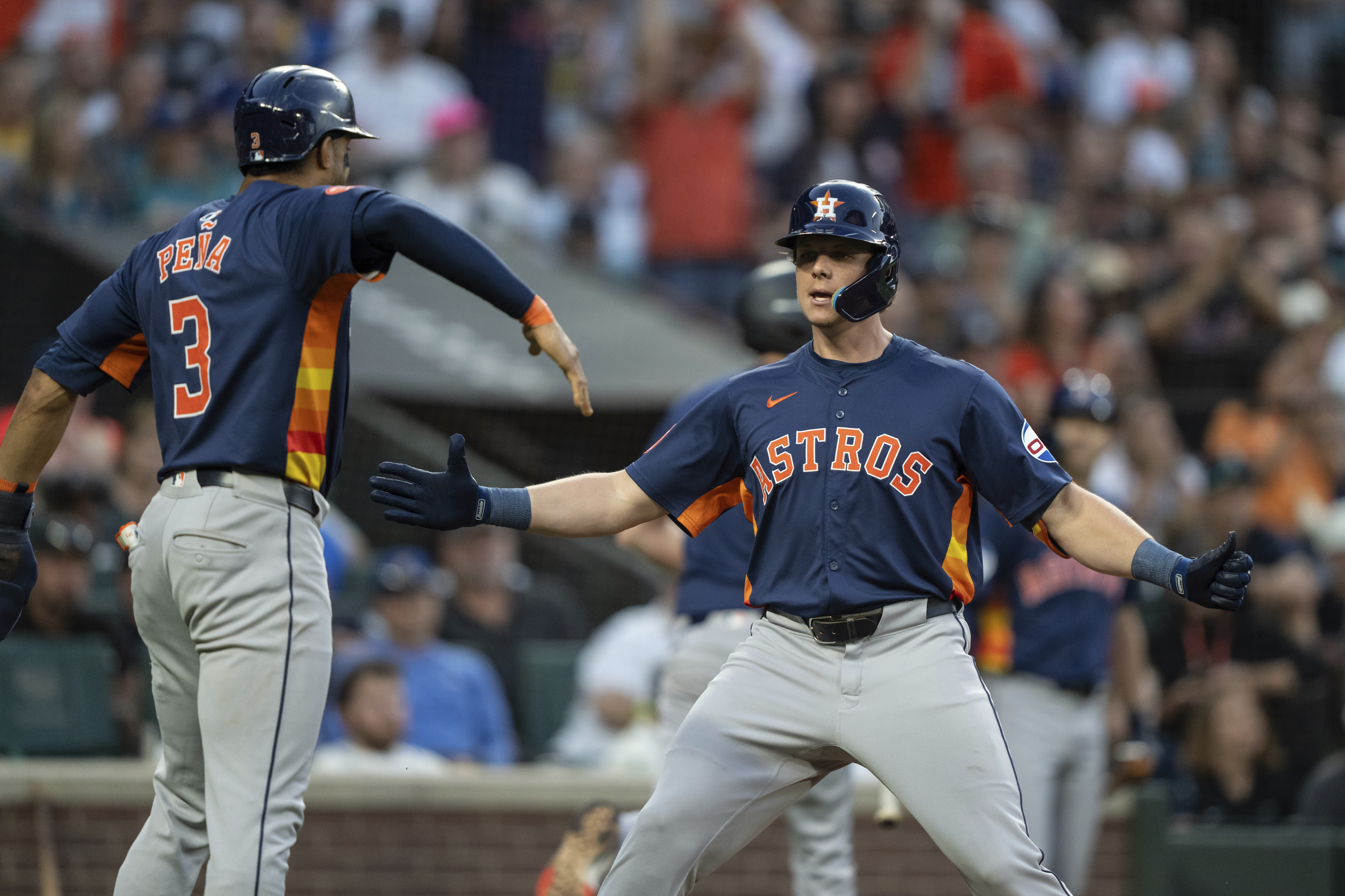 Houston Astros' Jake Meyers, right, celebrates with Jeremy Pena after hitting a two-run home run during the seventh inning of a baseball game against the Seattle Mariners, Saturday, July 20, 2024, in Seattle. 