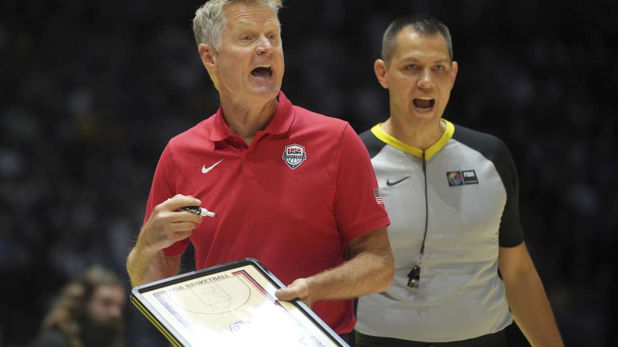 United States' head coach Steve Kerr gestures to his players during an exhibition basketball game between the United States and South Sudan, at the o2 Arena in London, Saturday, July 20, 2024.