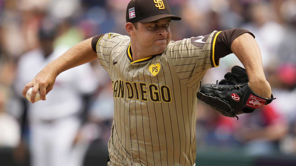 San Diego Padres' Michael King pitches in the first inning of a baseball game against the Cleveland Guardians, Sunday, July 21, 2024, in Cleveland.