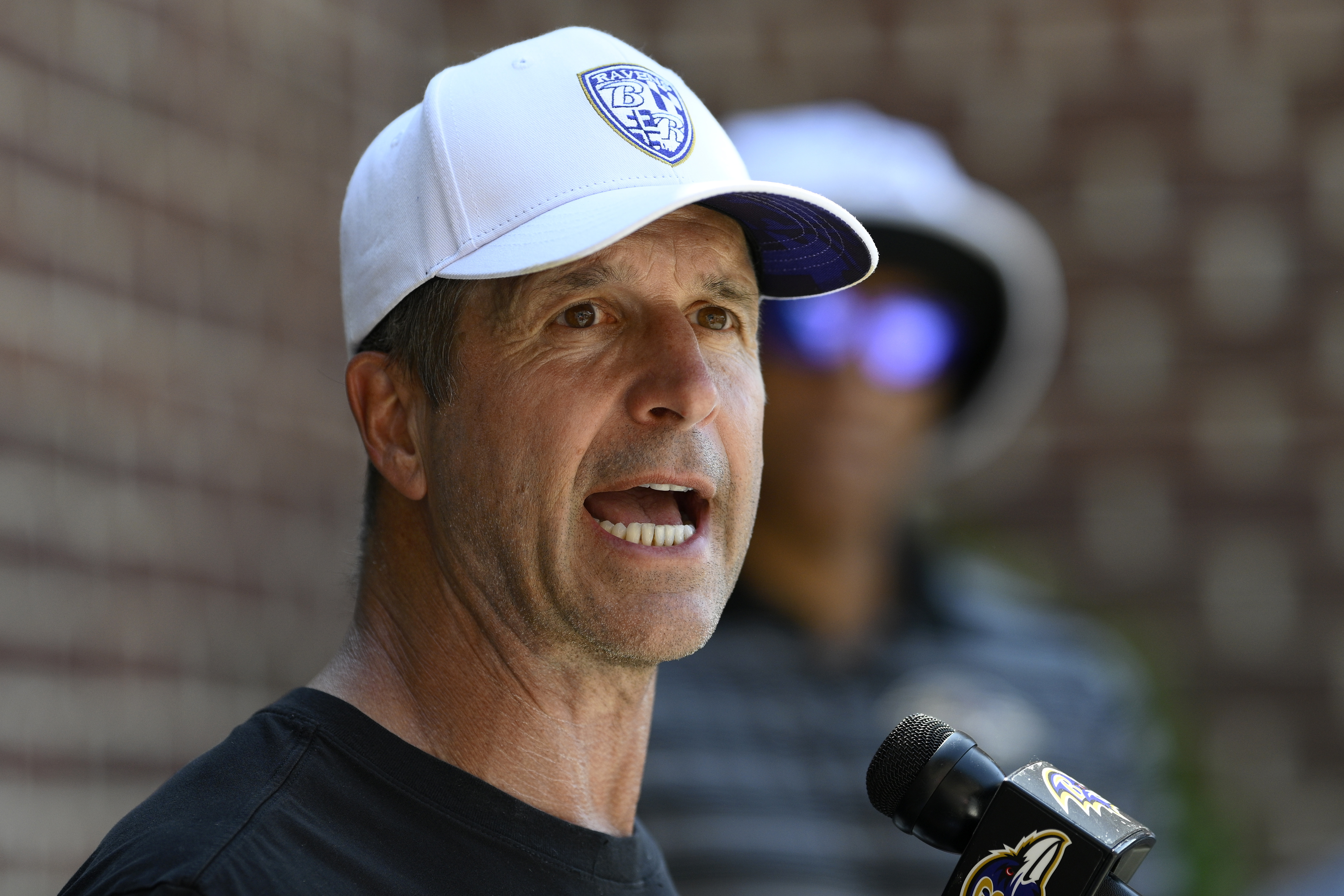 Baltimore Ravens head coach John Harbaugh talks to the media after an NFL football training camp practice, Sunday, July 21, 2024, in Owings Mills, Md.