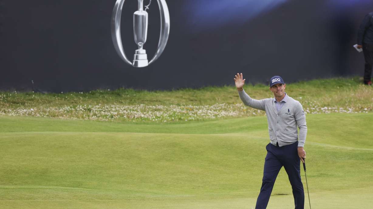 Billy Horschel of the United States waves as he walks onto the 18th green during his final round of the British Open Golf Championships at Royal Troon golf club in Troon, Scotland, Sunday, July 21, 2024.