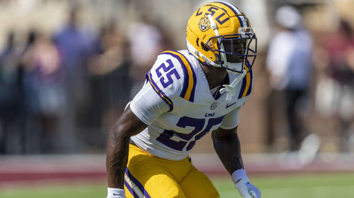 FILE - LSU safety Javien Toviano (25) during an NCAA football game, Sept. 16, 2023, in Starkville, Miss. Toviano surrendered to authorities Sunday, July 21, 2024, on charges of video voyeurism, the East Baton Rouge Parish sheriff's office said.