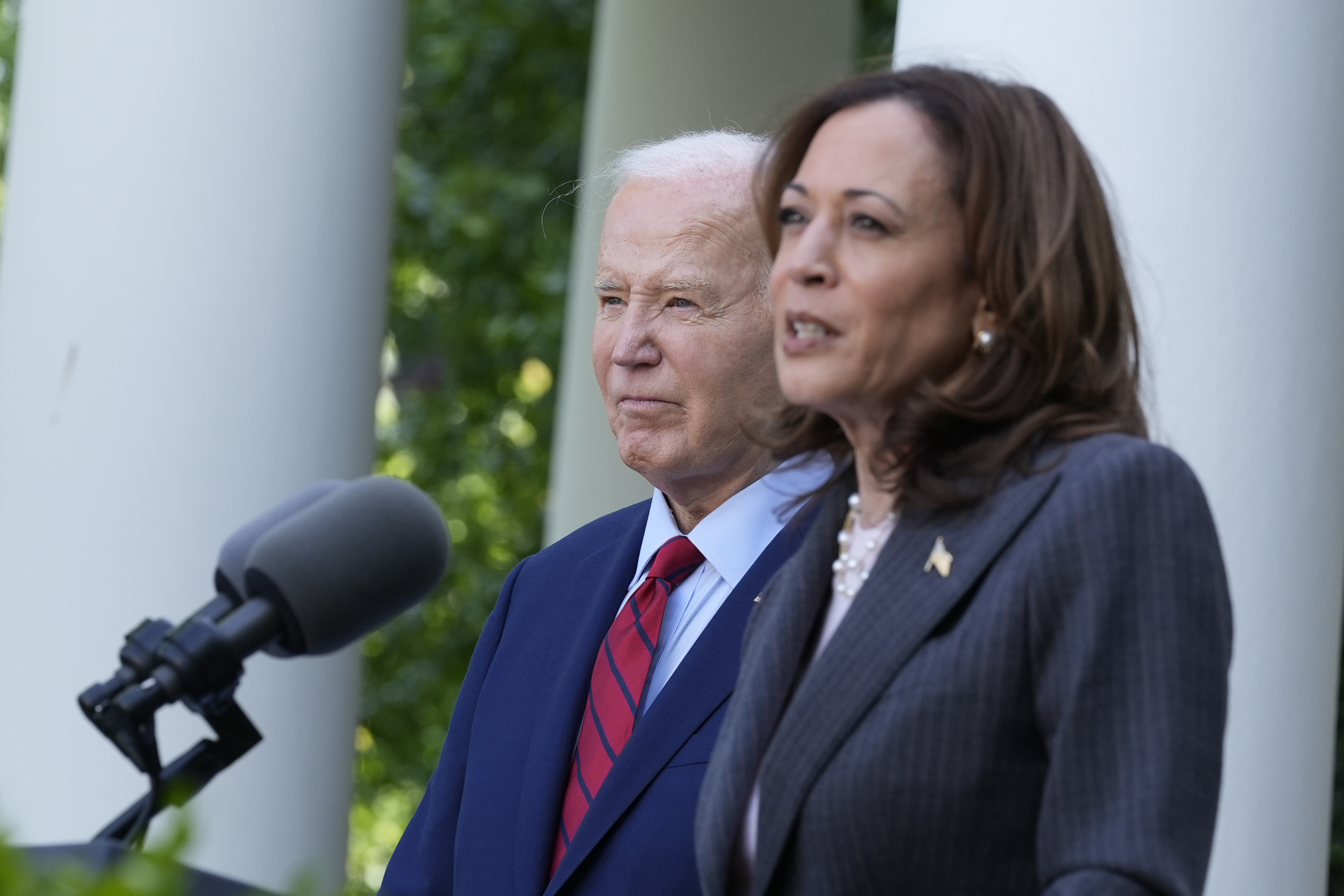 President Joe Biden listens as Vice President Kamala Harris speaks in the Rose Garden of the White House in Washington, May 13. Democrats now must navigate a shift that is unprecedented this late in an election year.