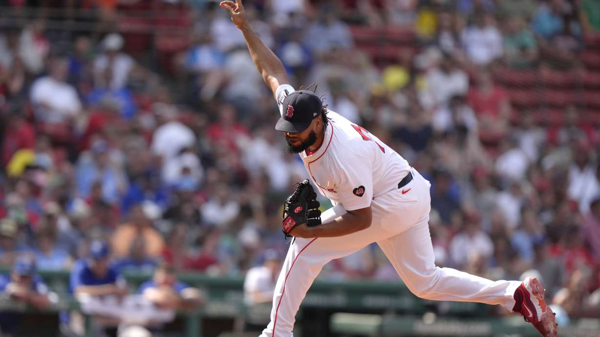 Boston Red Sox pitcher Kenley Jansen delivers a pitch to a Kansas City Royals batter in the eighth inning of a baseball game, Sunday, July 14, 2024, in Boston.