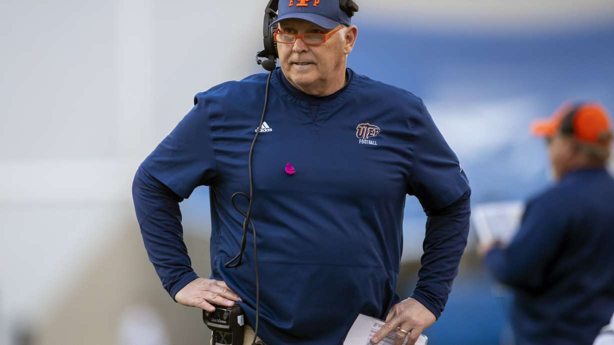 FILE - UTEP coach Dana Dimel reacts after talking to his players during a time out in an NCAA college football game against Liberty on Nov. 25, 2023, in El Paso, Texas. Dimel has been hired as a senior offensive assistant at Illinois, coach Bret Bielema announced Monday, July 22, 2024.