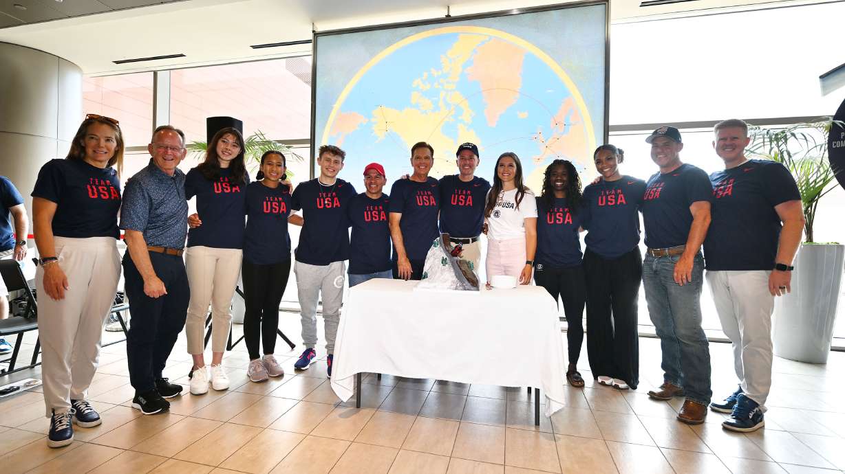 Utah’s Olympic delegation pose for a photo as they gather for a sendoff celebration at the Salt Lake International Airport prior to boarding a flight the France, on Monday, July 22, 2024.