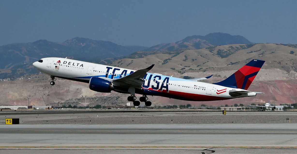 The plane carrying Utah’s Olympic delegation on Delta Flight 2034 bound for Paris lifts off from the Salt Lake City International Airport on Monday.