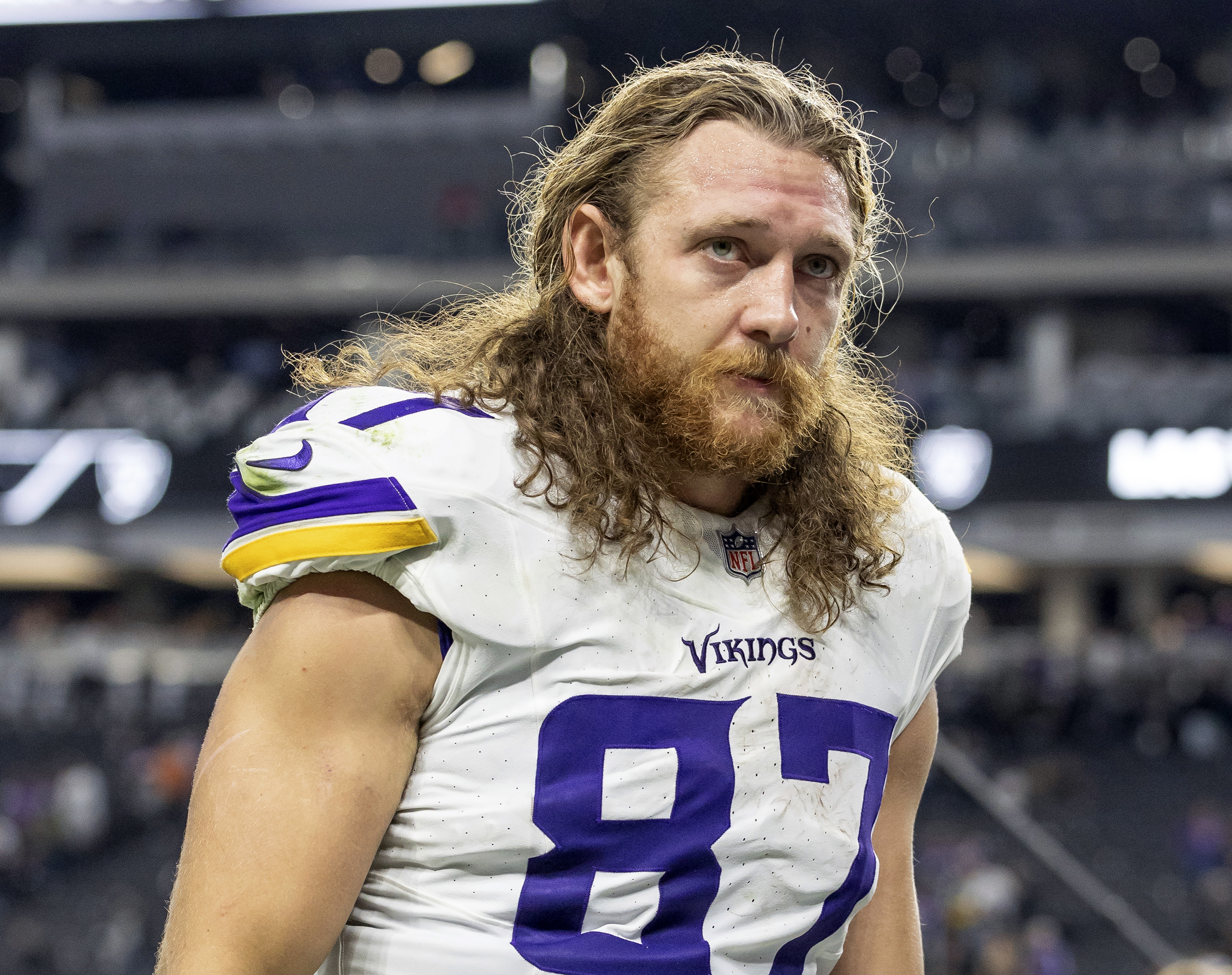 FILE - Minnesota Vikings tight end T.J. Hockenson walks off the field after an NFL football game against the Las Vegas Raiders, Dec. 10, 2023, in Las Vegas, Nev. Hockenson was placed on the physically unable to perform list Monday, July 22, 2024, for the beginning of training camp, still recovering as expected from a torn ACL and MCL in his right knee.