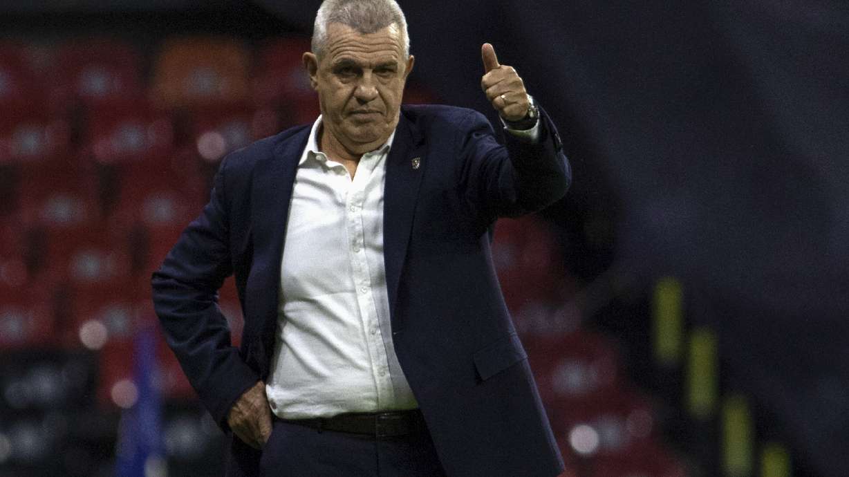 FILE - Monterrey's coach Javier Aguirre gives a thumbs-up to his players during a Mexican soccer league match against Cruz Azul at Azteca stadium in Mexico City, Nov. 21, 2021. Aguirre has been appointed head coach of Mexico's national team for the third time and will replace Jaime Lozano, the Mexican soccer federation confirmed Monday, July 22, 2024.