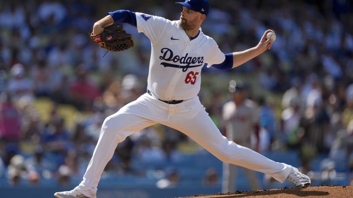 Los Angeles Dodgers starting pitcher James Paxton throws during the first inning of a baseball game against the Boston Red Sox, Sunday, July 21, 2024, in Los Angeles.