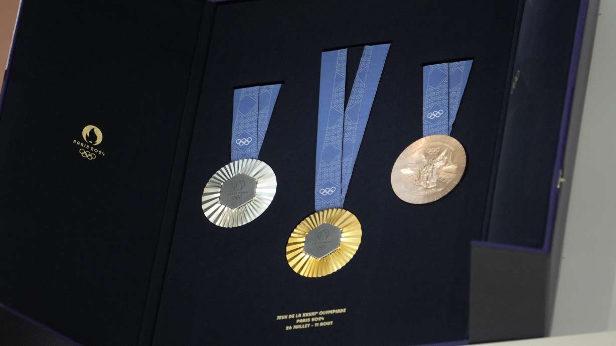 FILE - The medals for the Paris 2024 Olympic are displayed at the Paris Olympic organizers in Saint-Denis, outside Paris, Feb. 8, 2024.