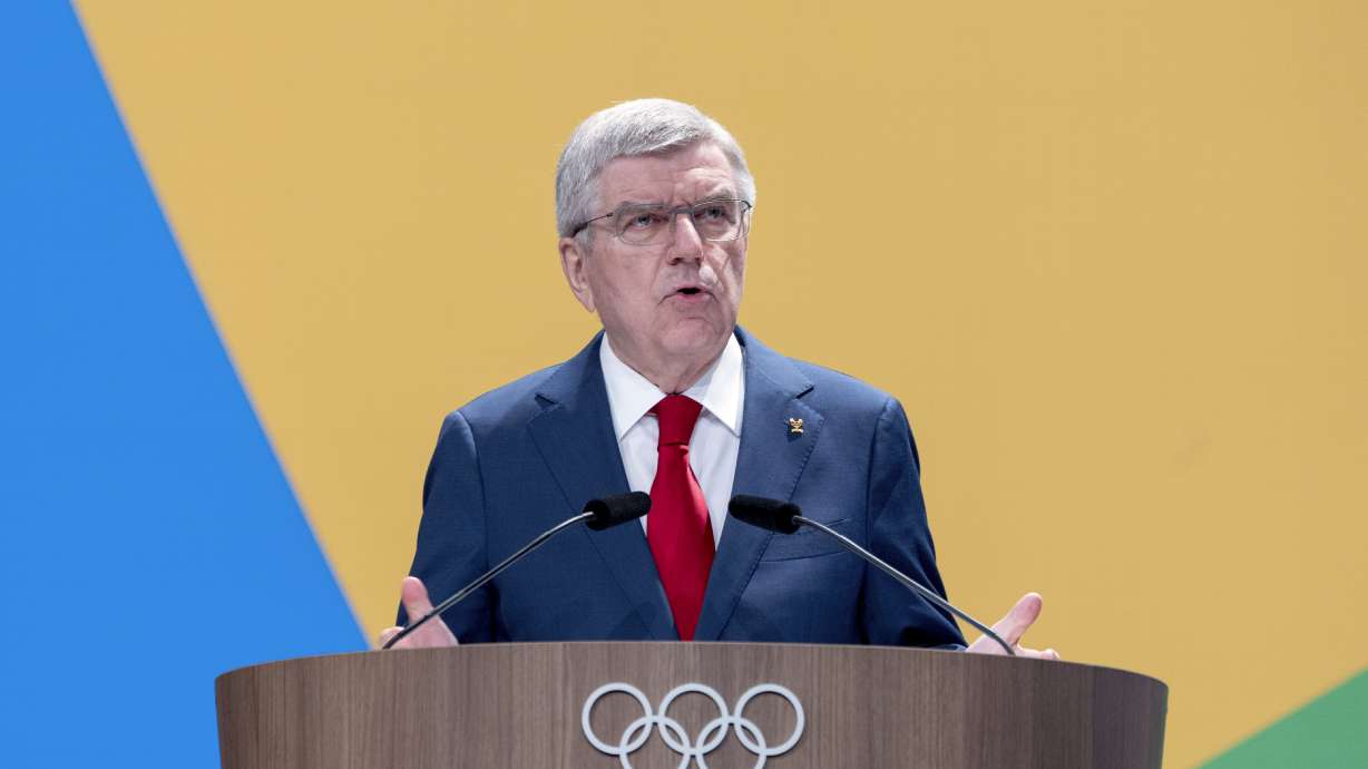 IOC President Thomas Bach speaks during the start of the 142nd IOC session at the 2024 Summer Olympics, Tuesday, July 23, 2024, in Paris.