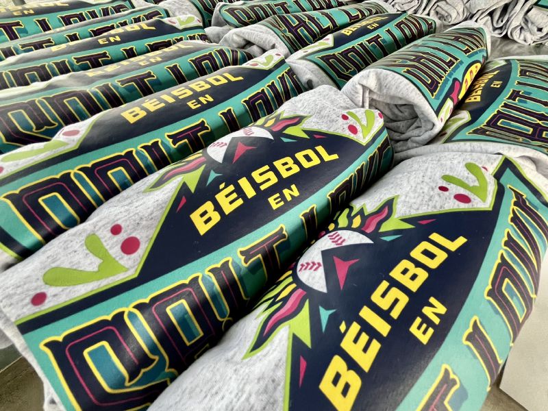 Béisbol en Salt Lake shirts are displayed on a table at Smith's Ballpark in Salt Lake City on Tuesday. - Carter Williams, KSL.com