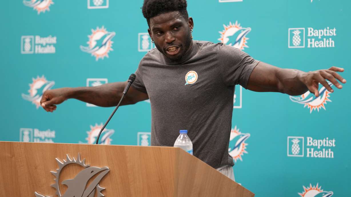 Miami Dolphins wide receiver Tyreek Hill speaks during a NFL football training camp news conference, Tuesday, July 23, 2024, in Miami Gardens, Fla.