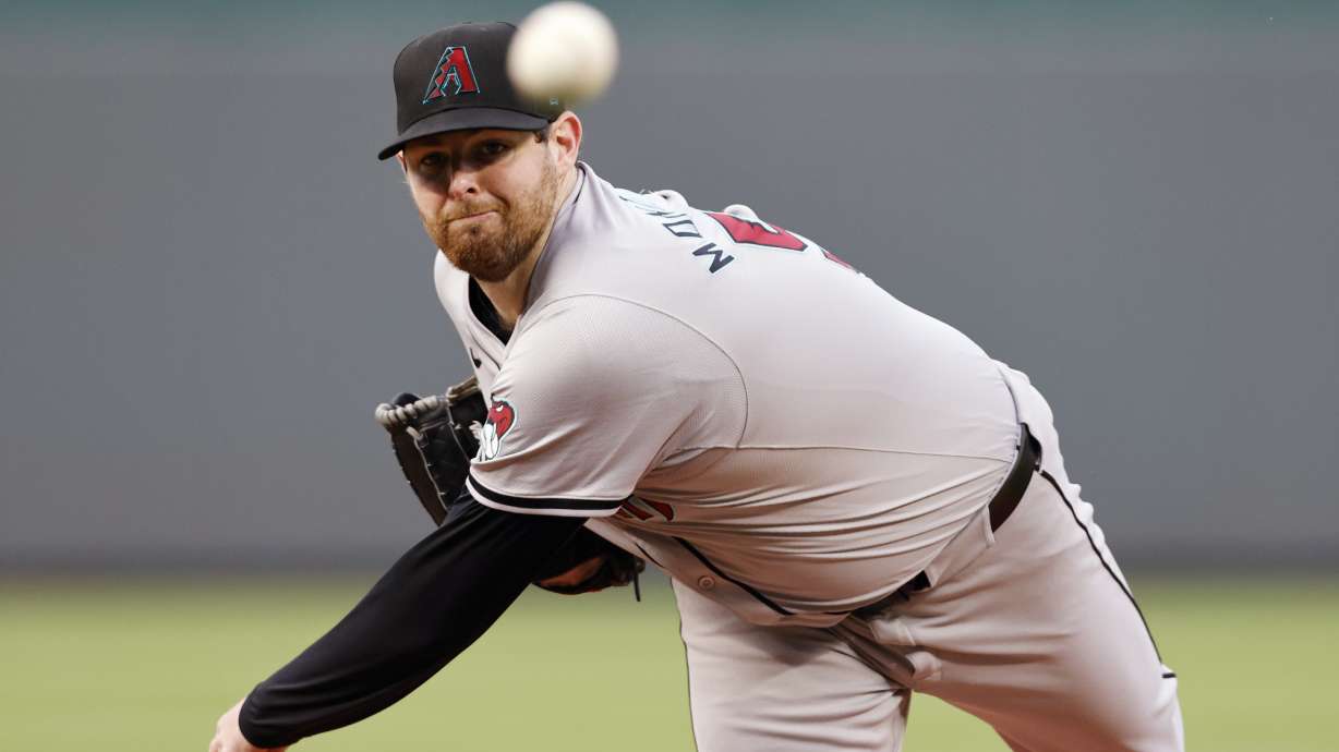 Arizona Diamondbacks pitcher Jordan Montgomery throws from the mound during the first inning of a baseball game against the Kansas City Royals in Kansas City, Mo., Tuesday, July 23, 2024.